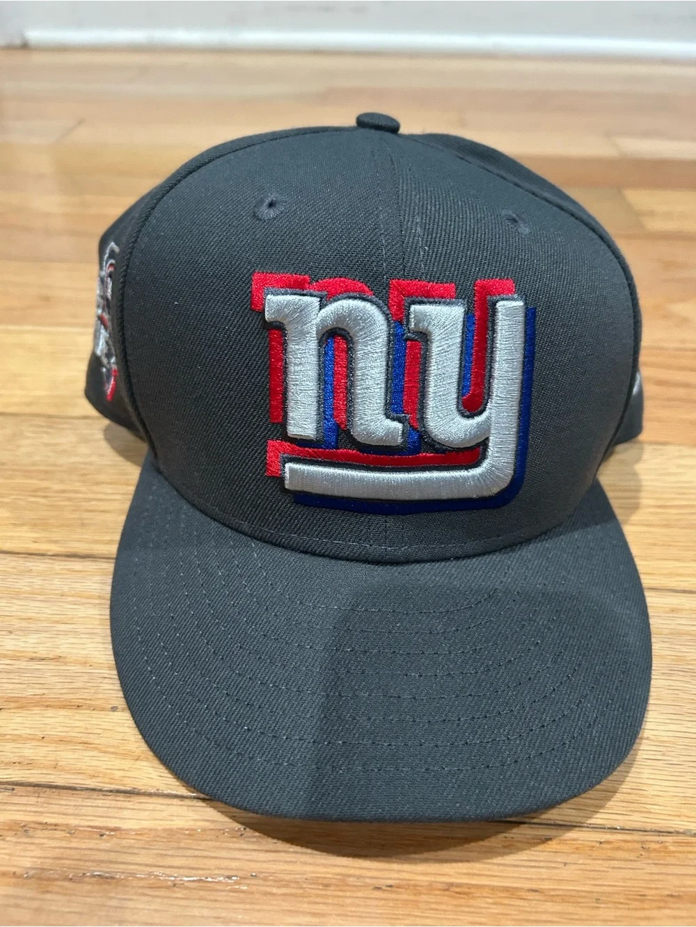 New Era Gray Snapback Hat with Red, White & Blue NY Logo